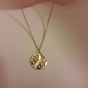 Goldtone starfish dainty necklace With Religious Back